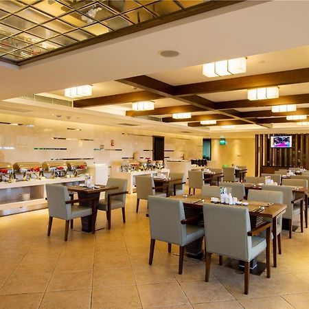 Joya International Hotel Sanya Extérieur photo